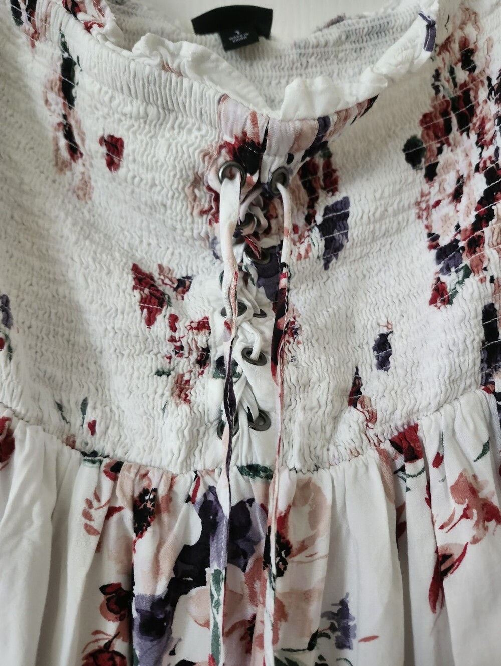 Torrid Size 1 White Floral Smocked Lace-Up Top.